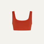 Product flat lay front view, terracotta red swim top