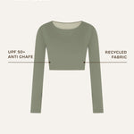 Front view of the Doris long-sleeve swim crop top rashguard in mineral green, highlighting the clean lines and sustainable details of this gender-neutral, nonbinary skin-wear design.