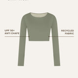 Front view of the Doris long-sleeve swim crop top rashguard in mineral green, highlighting the clean lines and sustainable details of this gender-neutral, nonbinary skin-wear design.