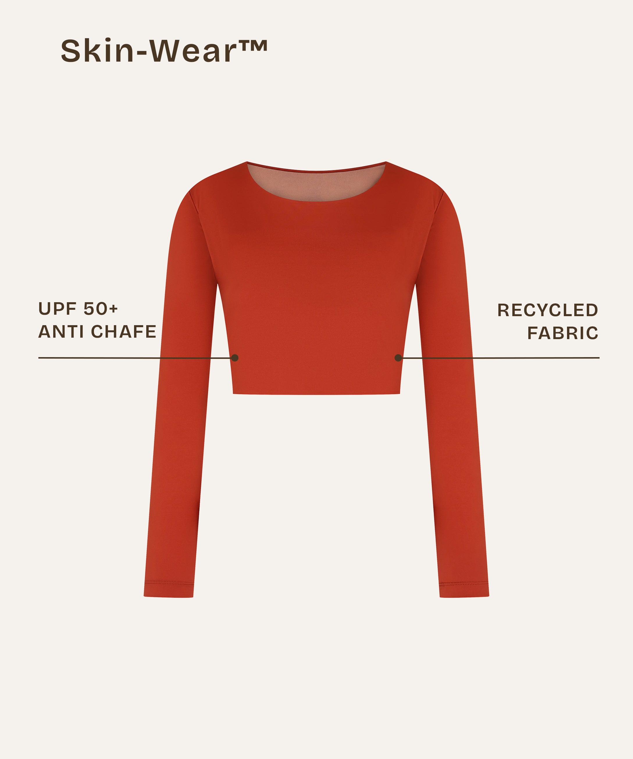 Front close-up showing the sustainable details of a terracotta red long-sleeve rashguard, designed as gender-neutral, nonbinary skin-wear with a sleek and minimal finish.