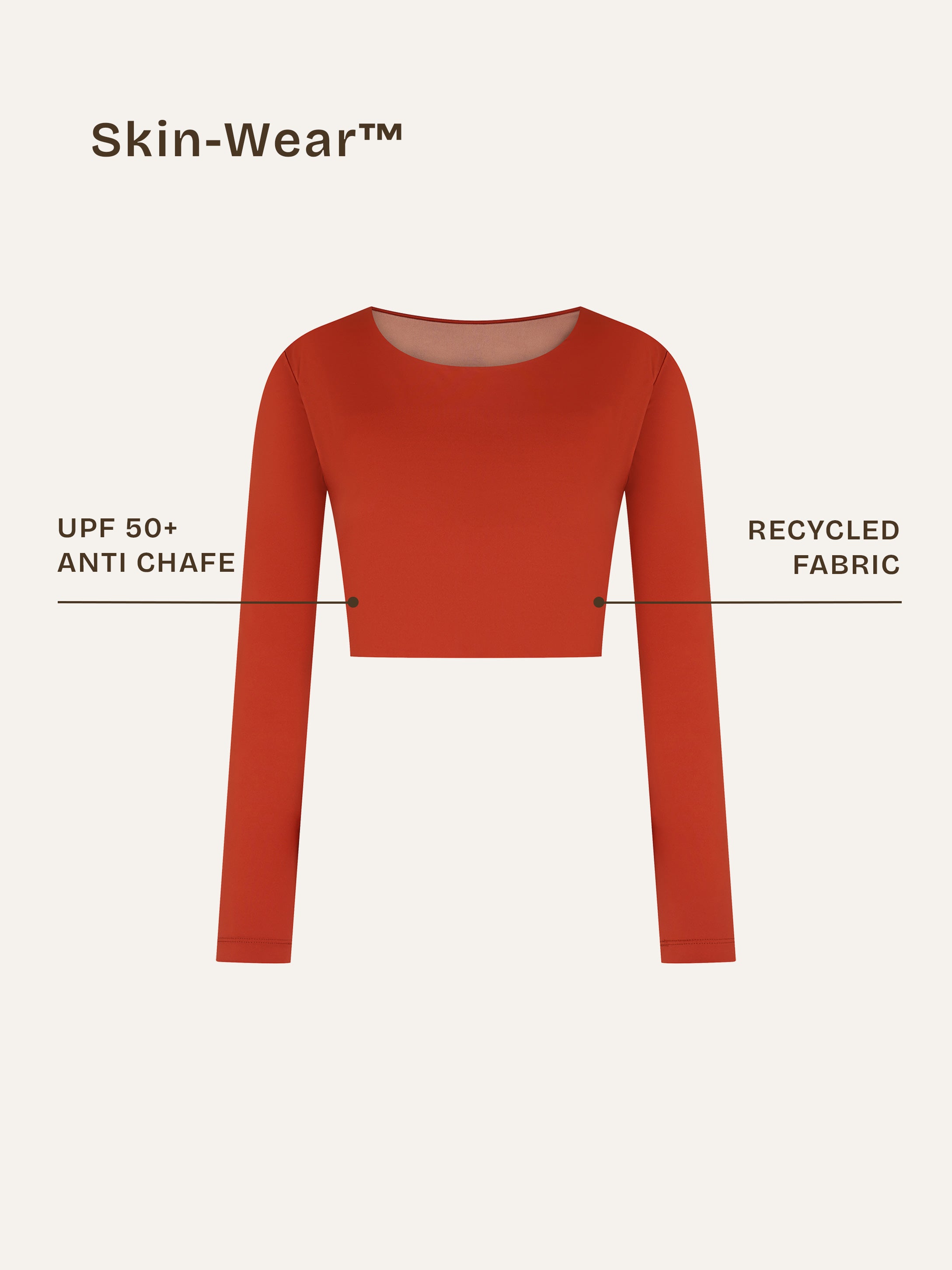 Front close-up showing the sustainable details of a terracotta red long-sleeve rashguard, designed as gender-neutral, nonbinary skin-wear with a sleek and minimal finish.