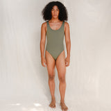 Person wearing Marsha one-piece swimsuit in mineral green, back view