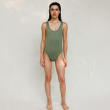 Person wearing Marsha one-piece swimsuit in mineral green, front view