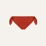 Product flat lay back view, terracotta red bikini bottom
