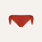 Product flat lay front view, terracotta red bikini bottom