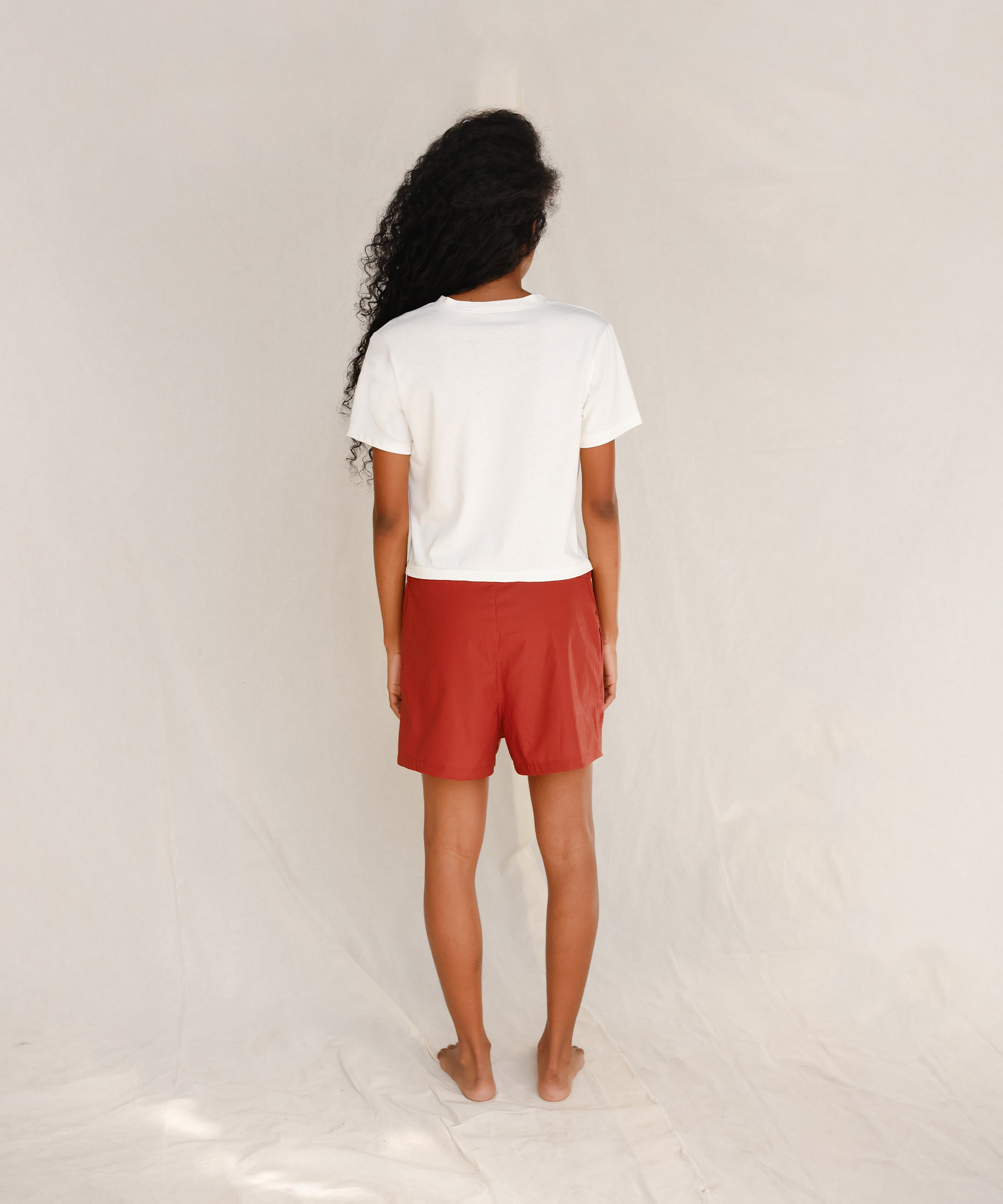 Back view of plain off-white cotton t-shirt 