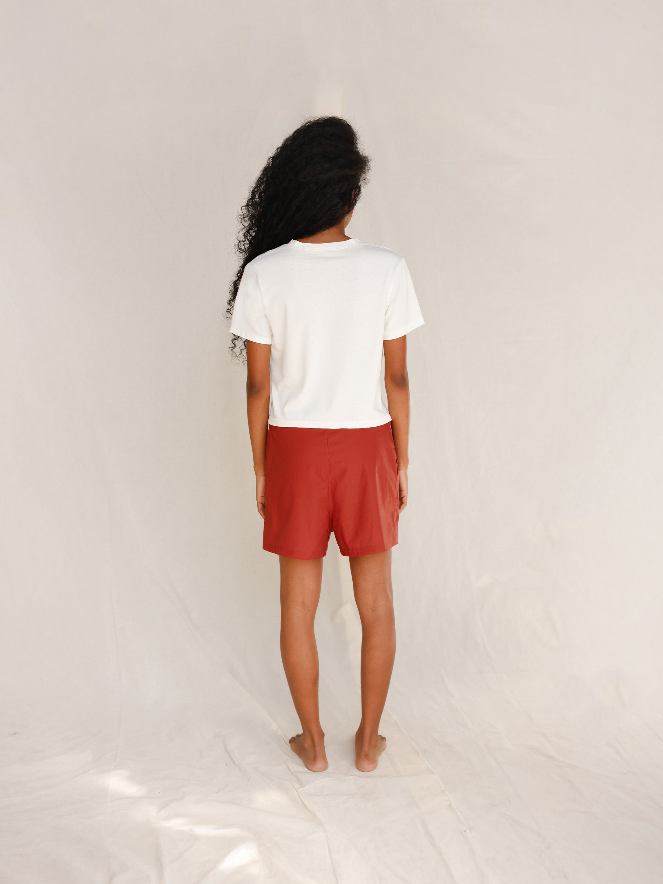 Back view of plain off-white cotton t-shirt 