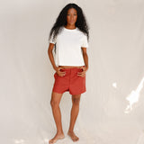 Front view of model wearing plain off-white cotton t-shirt
